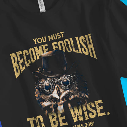 Become Foolish (1 Corinthians 3:18) | Premium Unisex Christian T-Shirt, laid flat, designed by 3rd Day Christian Clothing UK