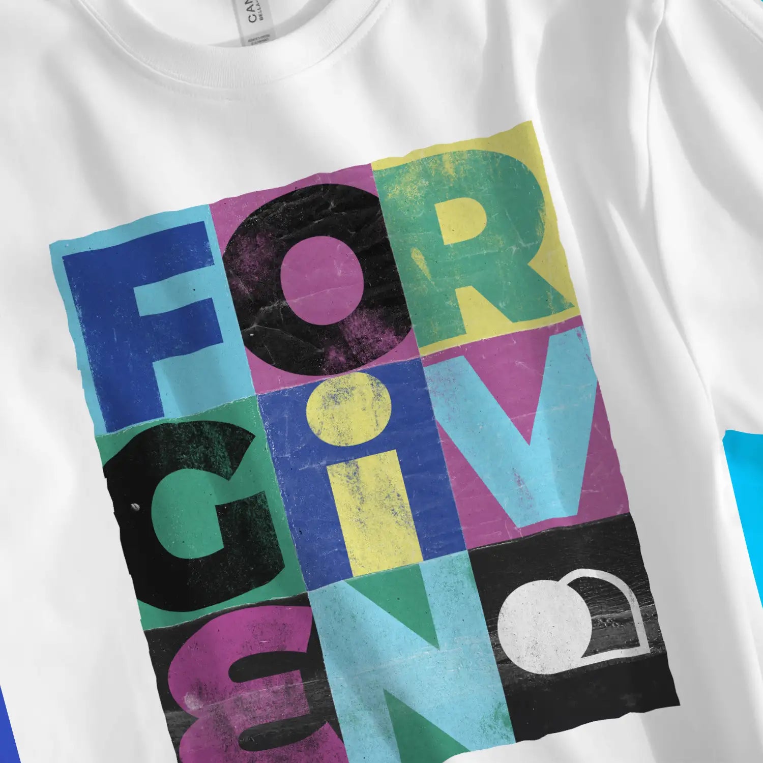 FORGIVEN (Creative) | Premium Unisex Christian T-Shirt, laid flat, designed by 3rd Day Christian Clothing UK