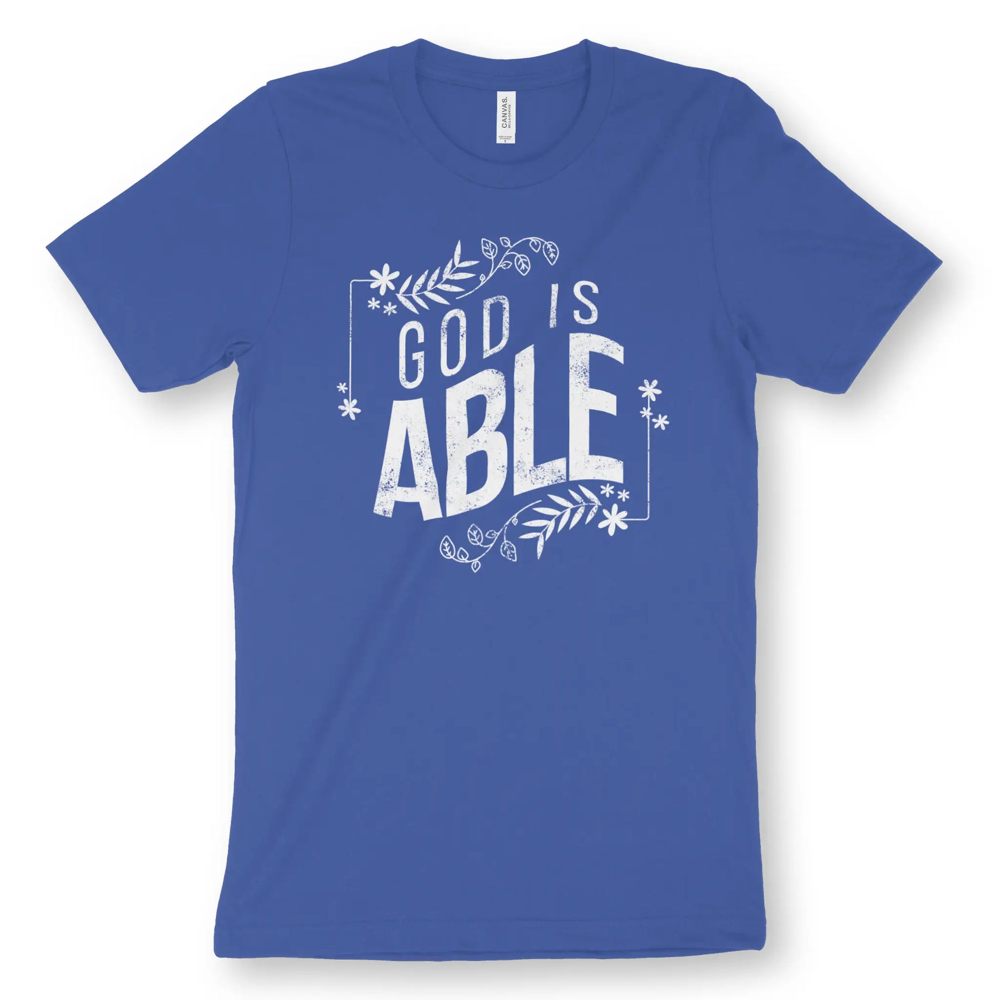 God Is Able (Floral) | Premium Unisex Christian T-Shirt, laid flat, designed by 3rd Day Christian Clothing UK