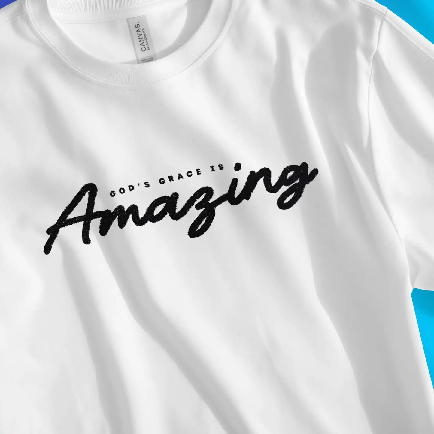 God's Grace Is Amazing (Ink) | Premium Unisex Christian T-Shirt, laid flat, designed by 3rd Day Christian Clothing UK