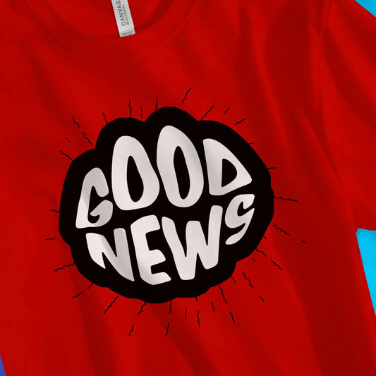 Good News (Burst) | Premium Unisex Christian T-Shirt, laid flat, designed by 3rd Day Christian Clothing UK