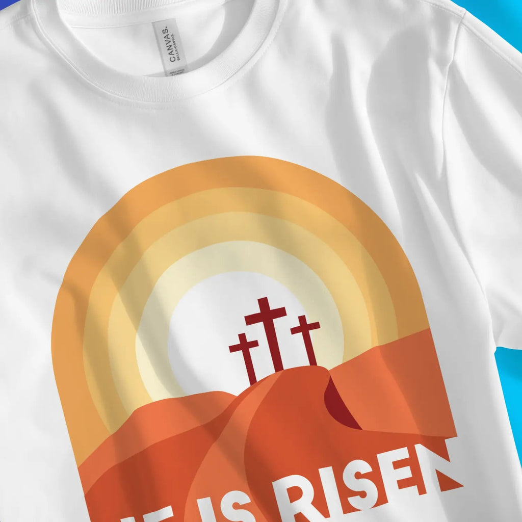 He Is Risen – Unisex Christian T-Shirt designed by 3rd Day Christian Clothing.