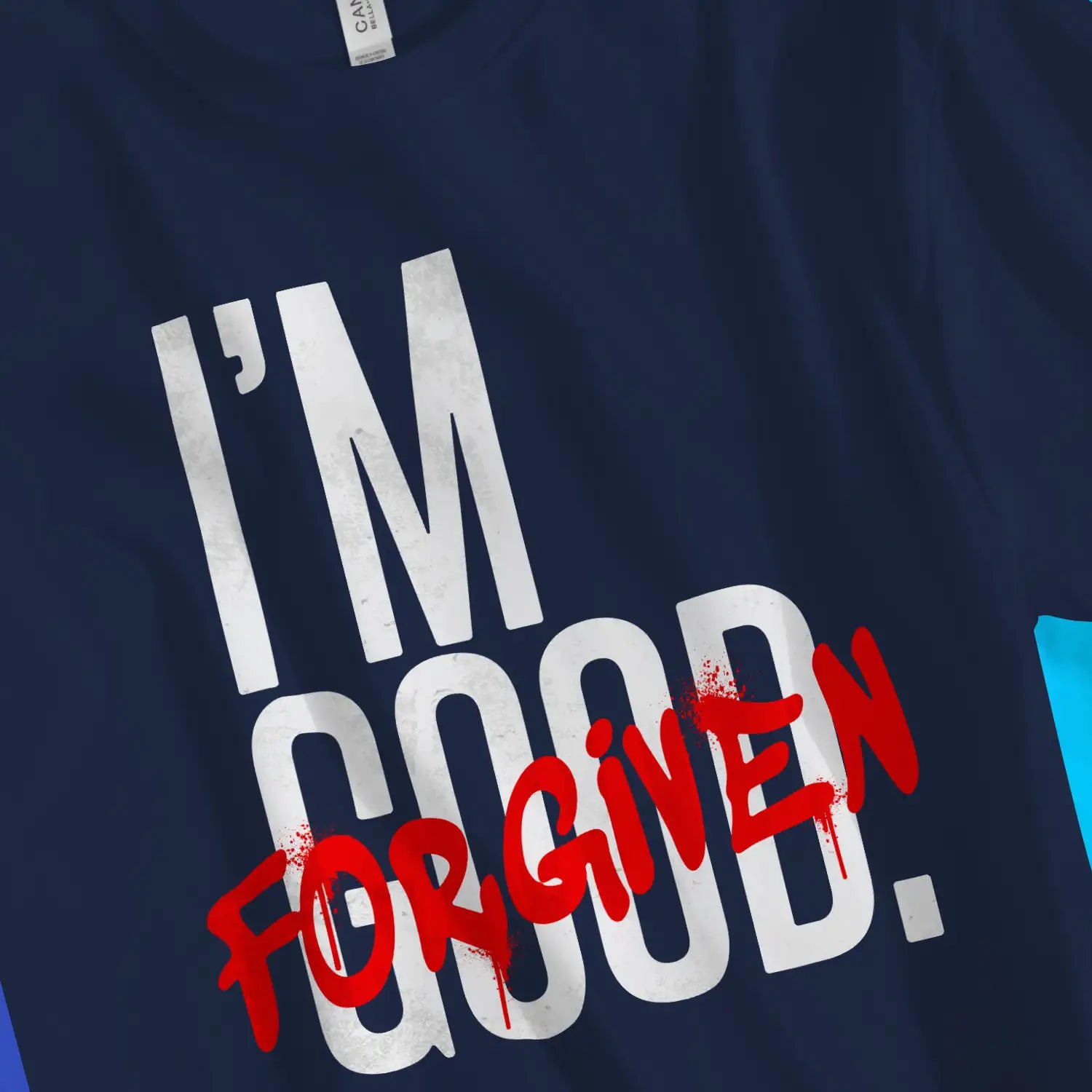 I'm FORGIVEN (Graffiti) | Premium Unisex Christian T-Shirt, laid flat, designed by 3rd Day Christian Clothing UK