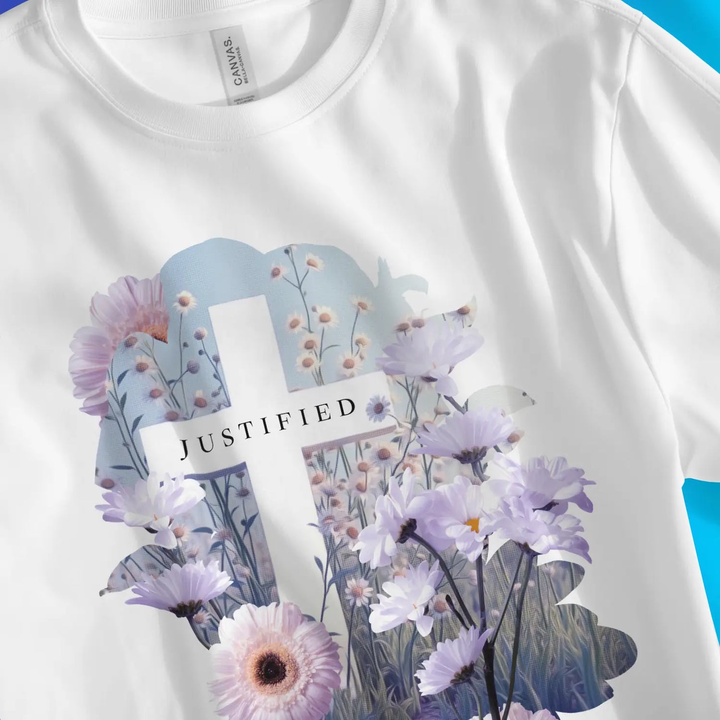 JUSTIFIED (Floral Cross) | Premium Unisex Christian T-Shirt, laid flat, designed by 3rd Day Christian Clothing UK