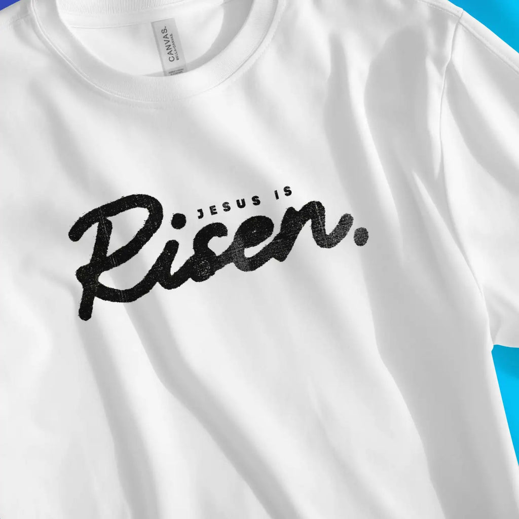 Jesus Is Risen. (Ink) – Unisex Christian T-Shirt designed by 3rd Day Christian Clothing.