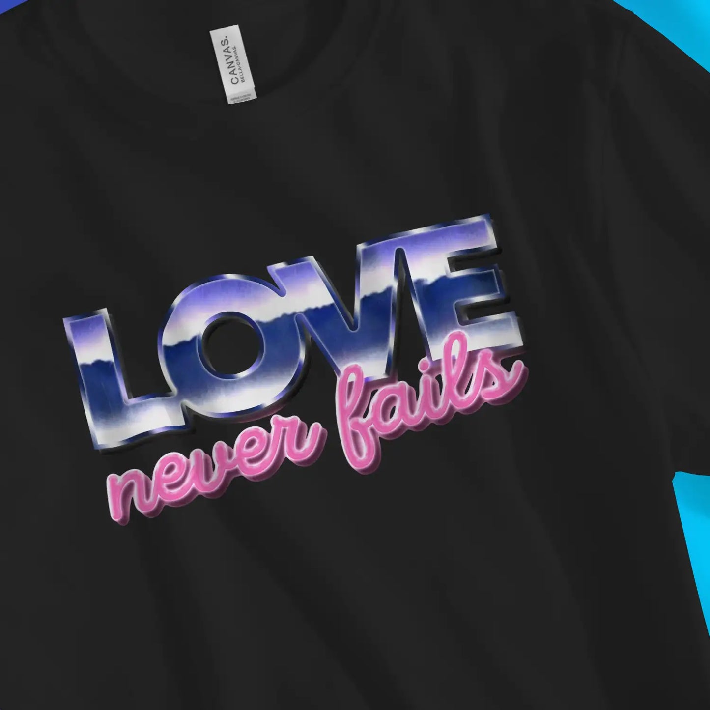 Love Never Fails (Retro) | Premium Unisex Christian T-Shirt, laid flat, designed by 3rd Day Christian Clothing UK