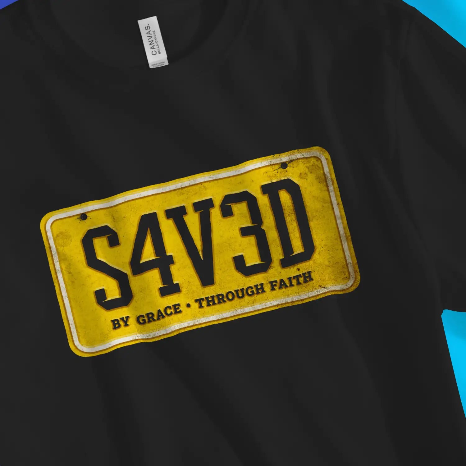 SAVED (Number Plate) | Premium Unisex Christian T-Shirt, laid flat, designed by 3rd Day Christian Clothing UK