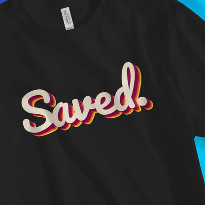 Saved. (3D) | Premium Unisex Christian T-Shirt, laid flat, designed by 3rd Day Christian Clothing UK