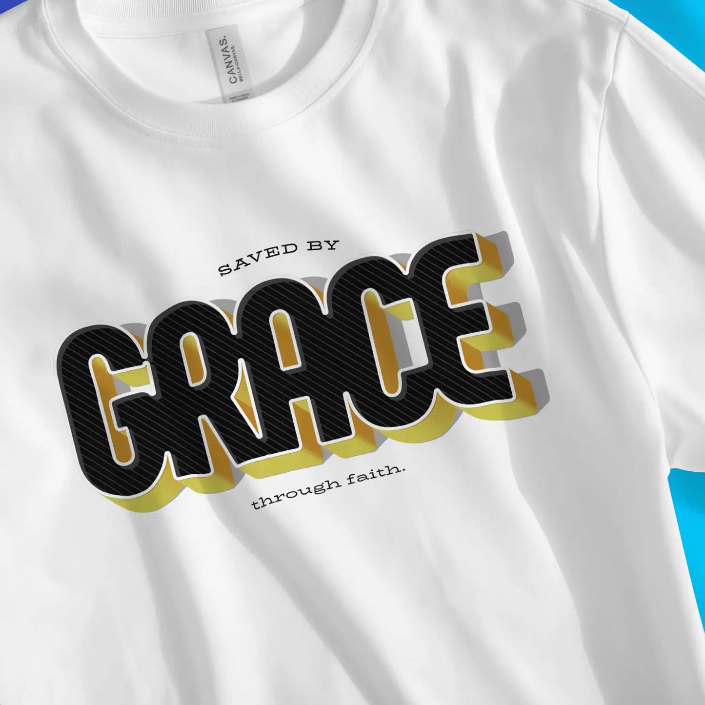 Saved By GRACE (3D) | Premium Unisex Christian T-Shirt, laid flat, designed by 3rd Day Christian Clothing UK