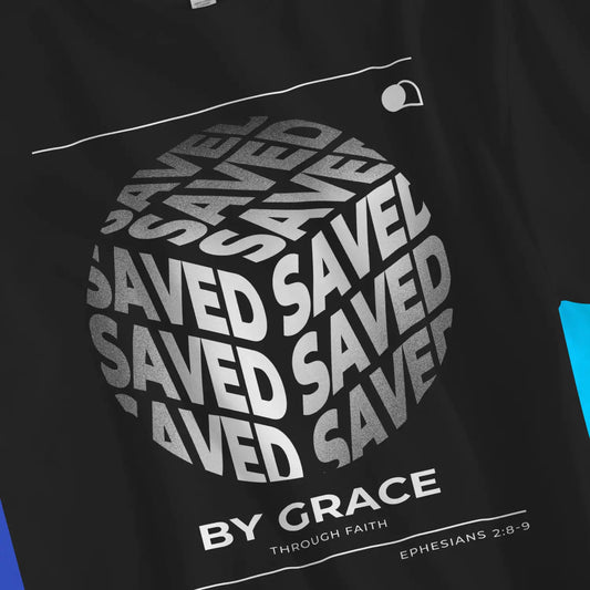 Saved By Grace (Cube) | Premium Unisex Christian T-Shirt, laid flat, designed by 3rd Day Christian Clothing UK