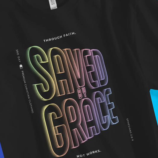 Saved By Grace (Neon Echo) 2.0 | Premium Unisex Christian T-Shirt, laid flat, designed by 3rd Day Christian Clothing UK