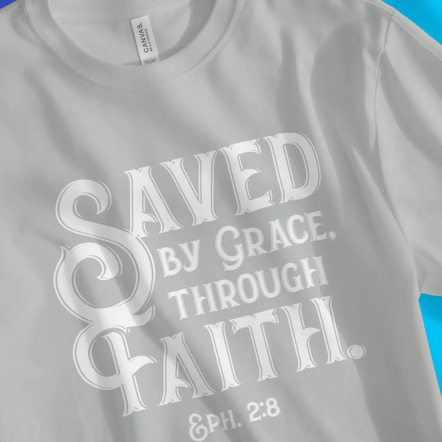 Saved By Grace Through Faith (Vintage) 2.0 | Premium Unisex Christian T-Shirt, laid flat, designed by 3rd Day Christian Clothing UK