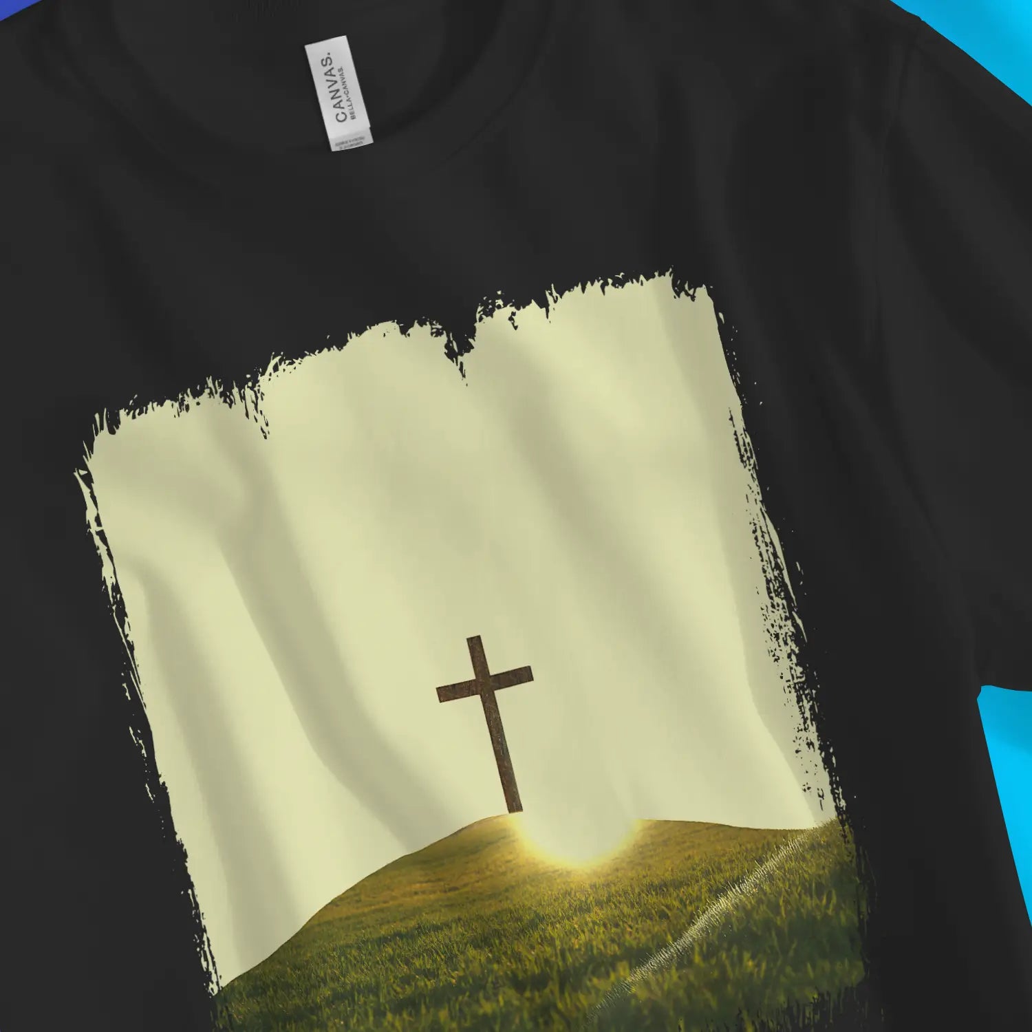 The Cross On A Hill | Premium Unisex Christian T-Shirt, laid flat, designed by 3rd Day Christian Clothing UK