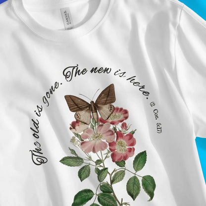 The New Is Here (2 Cor. 5:17) | Premium Unisex Christian T-Shirt, laid flat, designed by 3rd Day Christian Clothing UK