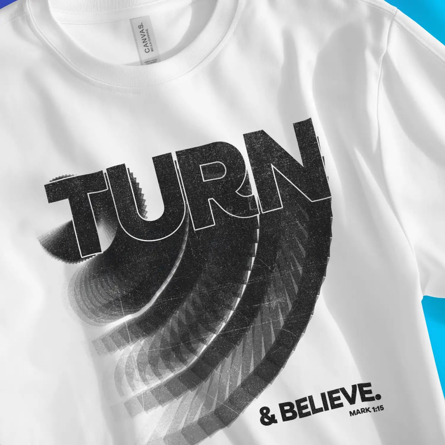 Turn & Believe (Mark 1:15) | Premium Unisex Christian T-Shirt, laid flat, designed by 3rd Day Christian Clothing UK