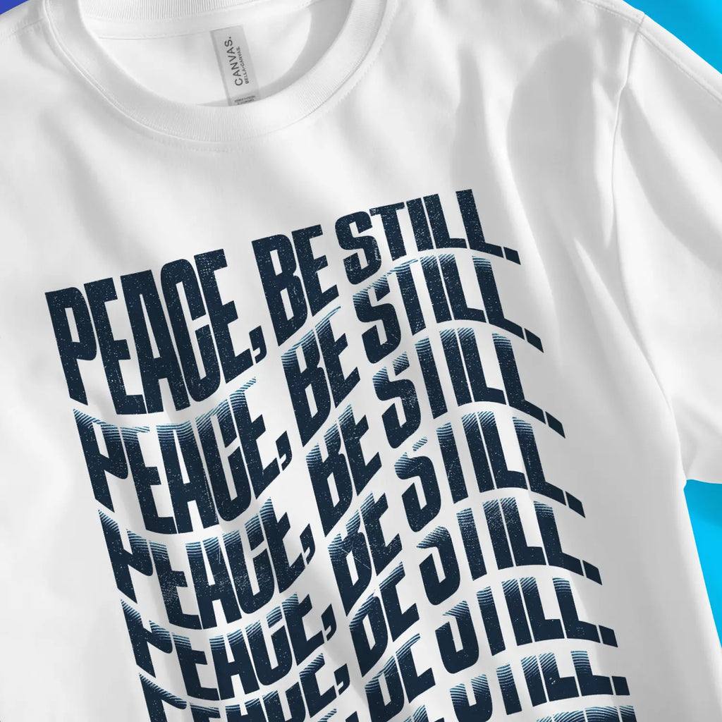 Peace, Be Still. (Wavy, White) – Unisex Christian T-Shirt