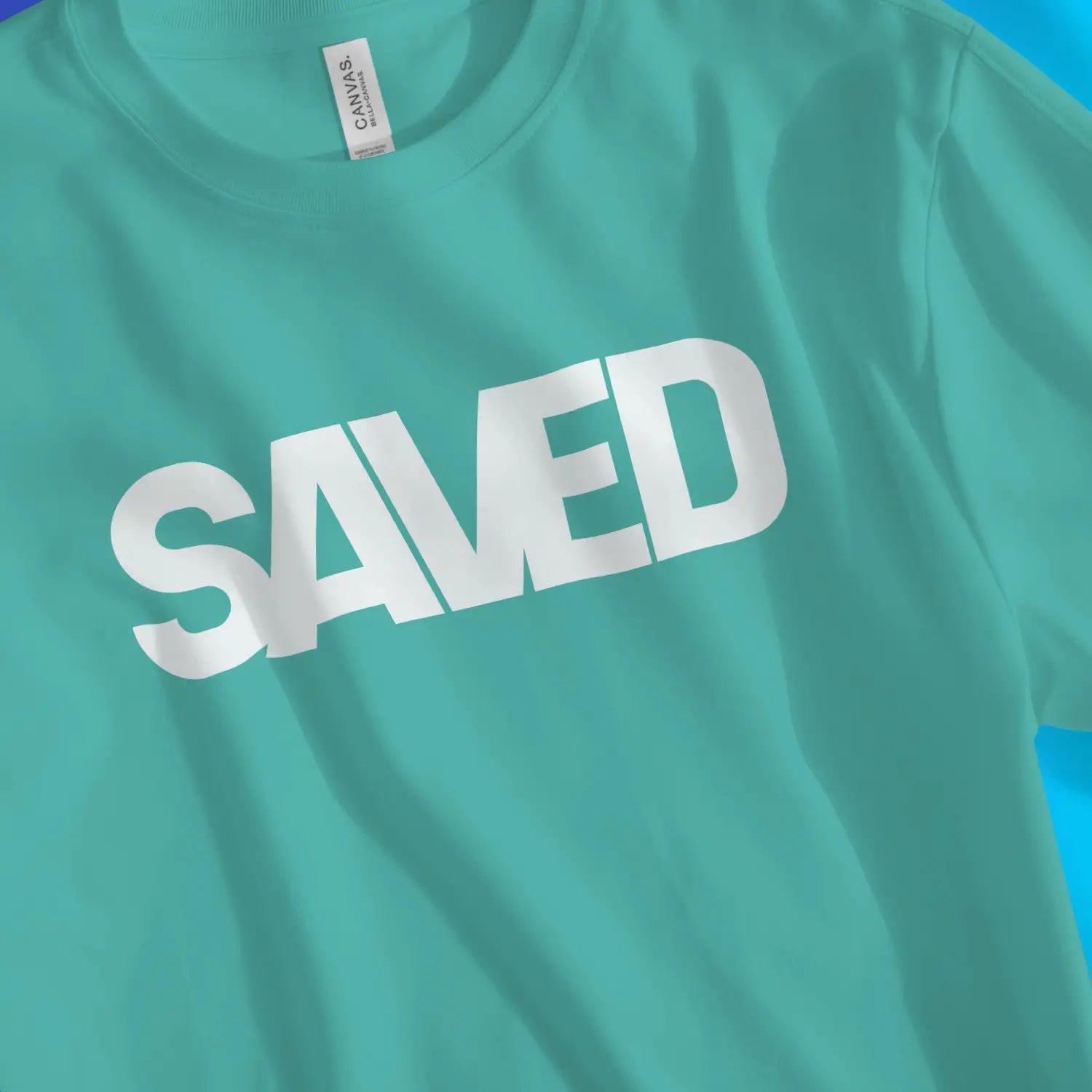 SAVED (Teal) – Unisex Christian T-Shirt designed by 3rd Day Christian Clothing.